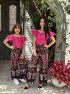 Solid Color Off Shoulder Ruffle Blouse & Loose Tie String Waist Wide Leg Printed Pants