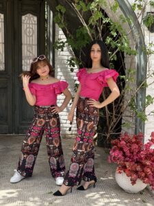 Solid Color Off Shoulder Ruffle Blouse & Loose Tie String Waist Wide Leg Printed Pants - Image 4